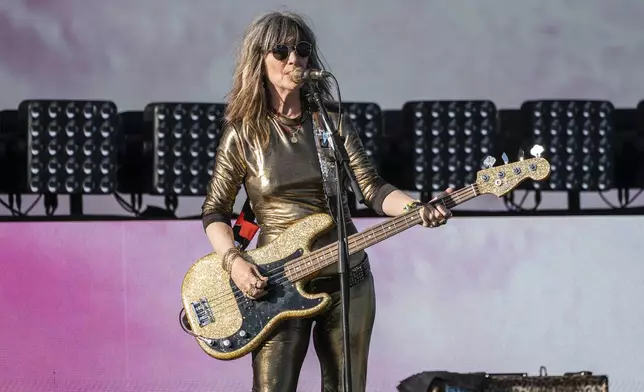 Kathy Valentine of The Go-Go's performs during the first weekend of the Coachella Valley Music and Arts Festival at the Empire Polo Club on Friday, April 11, 2025, in Indio, Calif. (Photo by Amy Harris/Invision/AP)