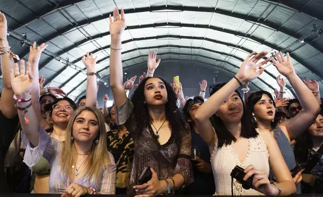 Festivalgoers are seen during the first weekend of the Coachella Valley Music and Arts Festival at the Empire Polo Club on Friday, April 11, 2025, in Indio, Calif. (Photo by Amy Harris/Invision/AP)