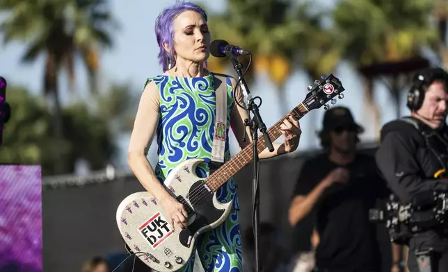 EDS NOTE: OBSCENITY - Jane Wiedlin of The Go-Go's performs during the first weekend of the Coachella Valley Music and Arts Festival at the Empire Polo Club on Friday, April 11, 2025, in Indio, Calif. (Photo by Amy Harris/Invision/AP)