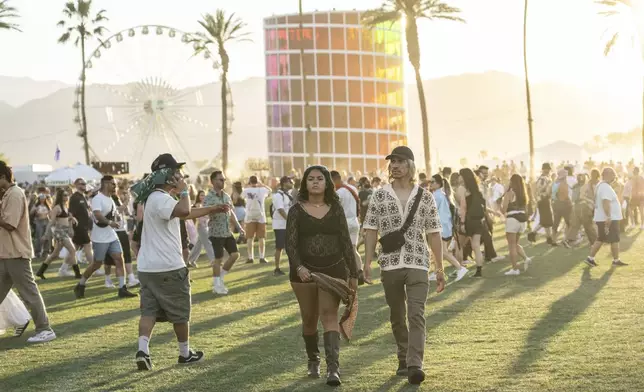 Festivalgoers are seen during the first weekend of the Coachella Valley Music and Arts Festival at the Empire Polo Club on Saturday, April 12, 2025, in Indio, Calif. (Photo by Amy Harris/Invision/AP)