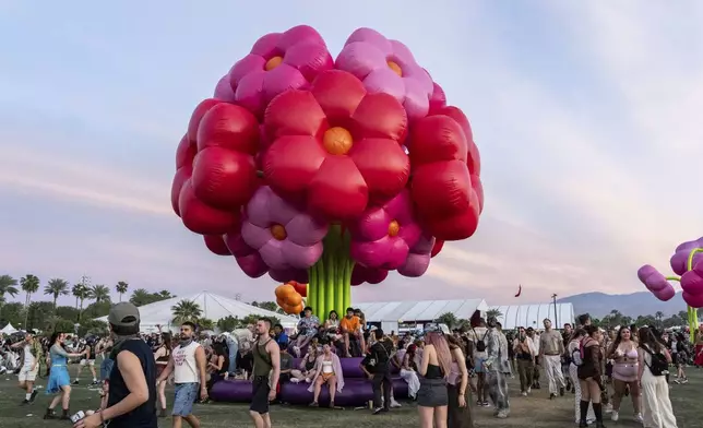 Festivalgoers are seen during the first weekend of the Coachella Valley Music and Arts Festival at the Empire Polo Club on Sunday, April 13, 2025, in Indio, Calif. (Photo by Amy Harris/Invision/AP)