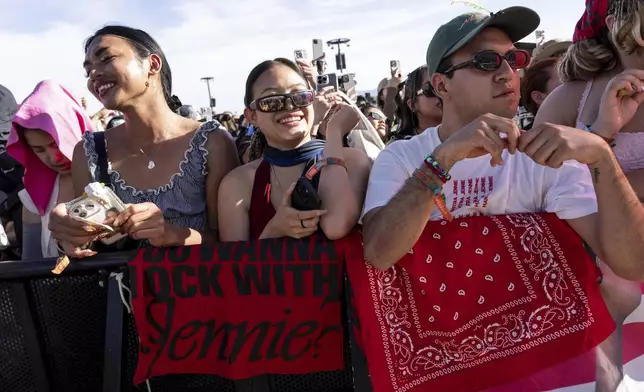 Festivalgoers are seen during the first weekend of the Coachella Valley Music and Arts Festival at the Empire Polo Club on Sunday, April 13, 2025, in Indio, Calif. (Photo by Amy Harris/Invision/AP)