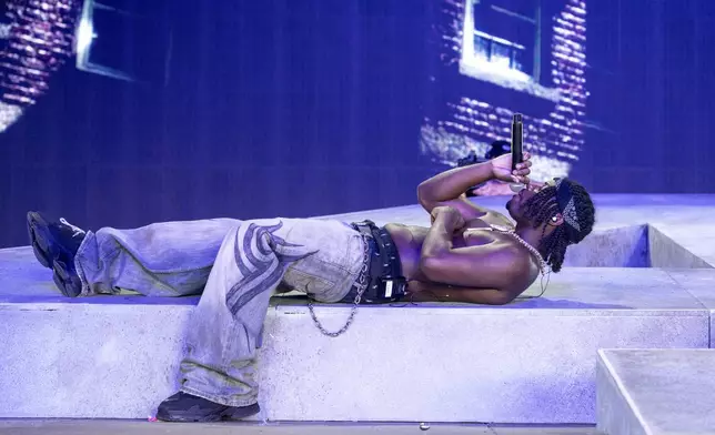 CORRECTS NAME TO 4BATZ - 4batz performs during the first weekend of the Coachella Valley Music and Arts Festival at the Empire Polo Club on Friday, April 11, 2025, in Indio, Calif. (Photo by Amy Harris/Invision/AP)