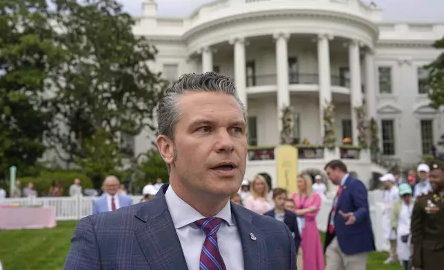 Defense Secretary Pete Hegseth speaks on the South Lawn of the White House before President Donald Trump and first lady Melania Trump participate in the White House Easter Egg Roll Monday, April 21, 2025, in Washington. (AP Photo/Alex Brandon)
