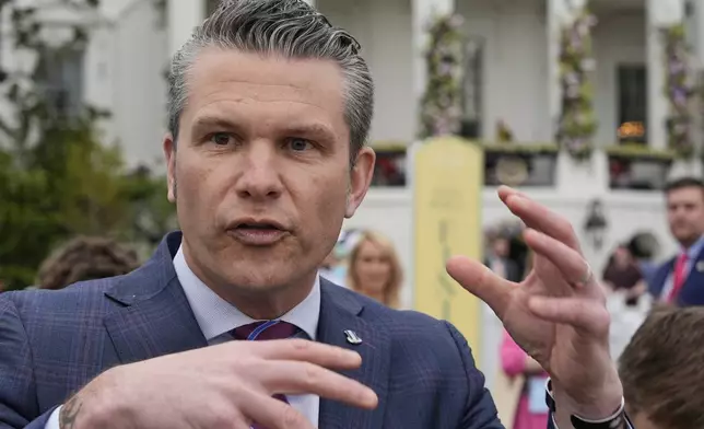 Defense Secretary Pete Hegseth speaks on the South Lawn of the White House before President Donald Trump and first lady Melania Trump participate in the White House Easter Egg Roll Monday, April 21, 2025, in Washington. (AP Photo/Alex Brandon)