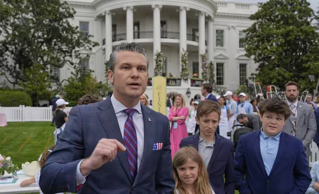 Defense Secretary Pete Hegseth speaks on the South Lawn of the White House before President Donald Trump and first lady Melania Trump participate in the White House Easter Egg Roll Monday, April 21, 2025, in Washington. (AP Photo/Alex Brandon)