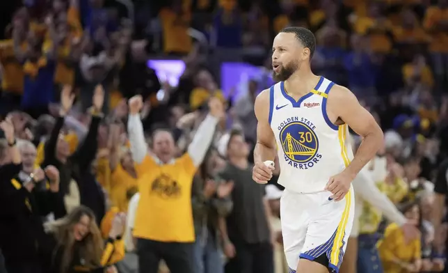 Golden State Warriors guard Stephen Curry (30) celebrates after making a 3-point basket during the second half of Game 3 of an NBA basketball first-round playoff series against the Houston Rockets in San Francisco, Saturday, April 26, 2025. (AP Photo/Jeff Chiu)