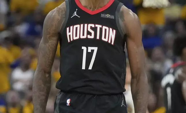 Houston Rockets forward Tari Eason (17) reacts after scoring against the Golden State Warriors during the first half of Game 3 of an NBA basketball first-round playoff series in San Francisco, Saturday, April 26, 2025. (AP Photo/Jeff Chiu)