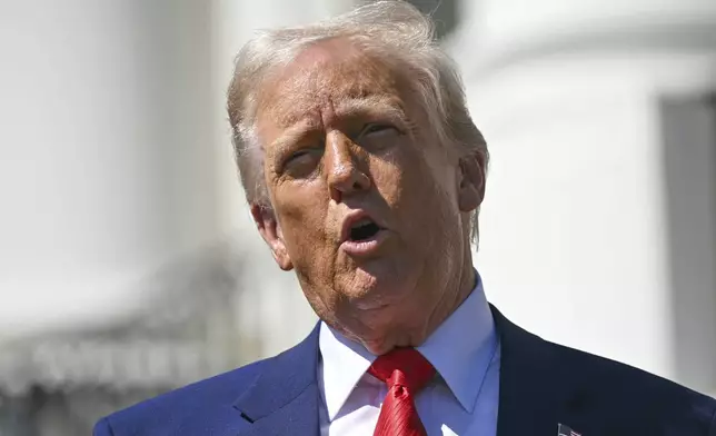 President Donald Trump speaks during an event with auto racing champions at the South Portico of the White House Wednesday, April 9, 2025, in Washington, (Pool via AP)