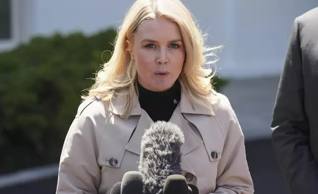 White House press secretary Karoline Leavitt speaks to reporters outside the West Wing of the White House, Wednesday, April 9, 2025, in Washington. (AP Photo/Jacquelyn Martin)