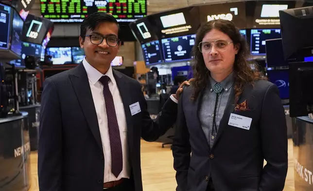 XPRIZE Carbon Removal winners from Mati Carbon, Founder &amp; CEO Shantanu Agarwal, left, and Chief Science Officer Jake Jordan, visit the trading floor of the New York Stock Exchange, Tuesday, April 22, 2025. (AP Photo/Richard Drew)