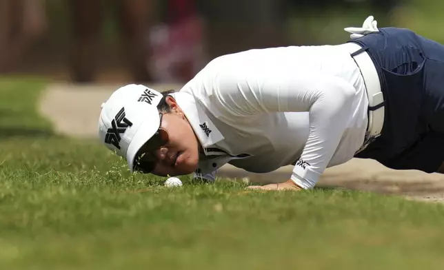 Auston Kim looks at her ball on the tenth hole during the second round of the Chevron Championship LPGA golf tournament Friday, April 25, 2025, in The Woodlands, Texas. (AP Photo/Eric Gay)