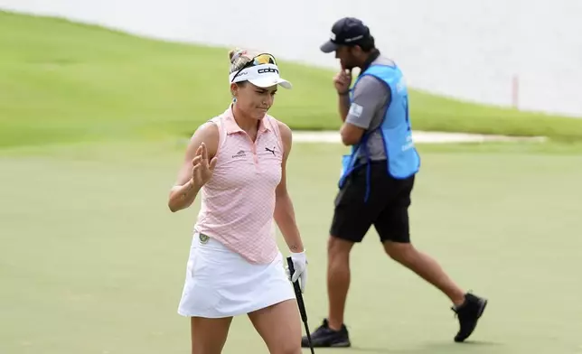 Lexi Thompson reacts on the fifth hole during the second round of the Chevron Championship LPGA golf tournament Friday, April 25, 2025, in The Woodlands, Texas. (AP Photo/Ashley Landis)