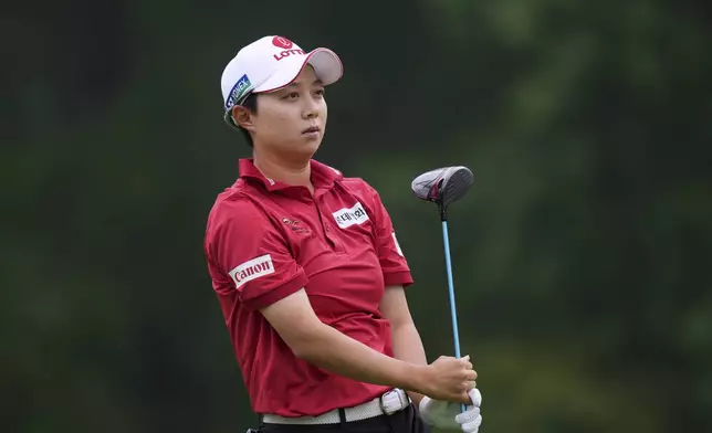 Hyo Joo Kim, of South Korea, watches after hitting on the tenth hole during the second round of the Chevron Championship LPGA golf tournament Friday, April 25, 2025, in The Woodlands, Texas. (AP Photo/Eric Gay)