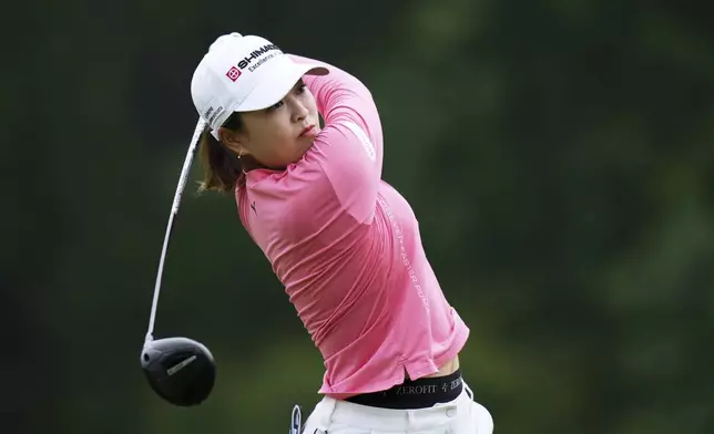 Mao Saigo, of Japan, hits on the tenth hole during the second round of the Chevron Championship LPGA golf tournament Friday, April 25, 2025, in The Woodlands, Texas. (AP Photo/Eric Gay)