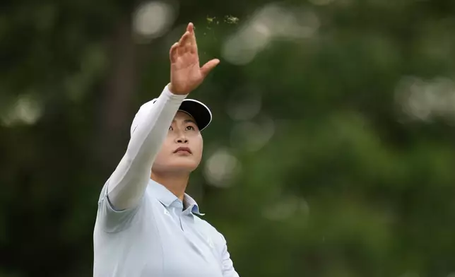 Yan Liu, of China, prepares to hit on the sixth hole during the second round of the Chevron Championship LPGA golf tournament Friday, April 25, 2025, in The Woodlands, Texas. (AP Photo/Ashley Landis)