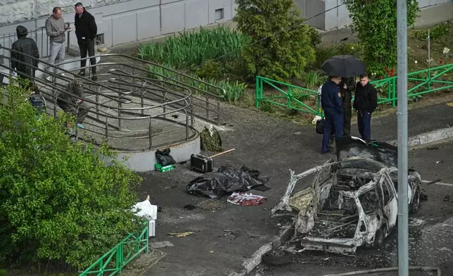 Security personnel work the scene where Lt. Gen. Yaroslav Moskalik, a deputy head of the main operational department in the General Staff of the Russian armed forces, was killed by an explosive device placed in his car in Balashikha, just outside Moscow, Russia, on Friday, April 25, 2025. (AP Photo)