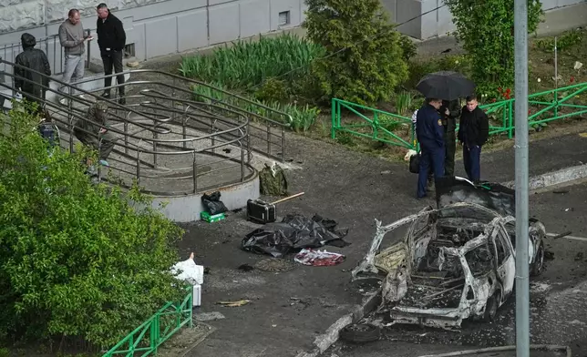 A view of the scene where Lt. Gen. Yaroslav Moskalik, a deputy head of the main operational department in the General Staff of the Russian armed forces, was killed by an explosive device placed in his car in Balashikha, just outside Moscow, Russia, on Friday, April 25, 2025. (AP Photo)