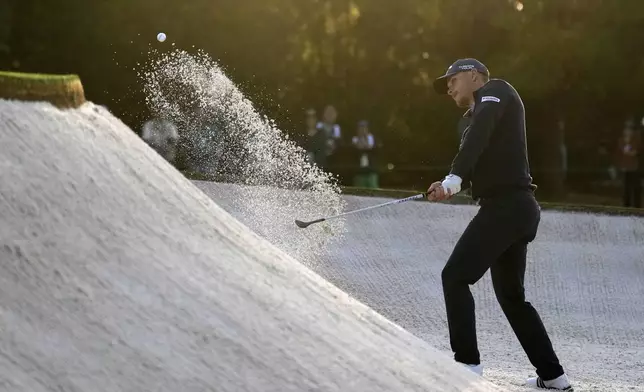 Nicolai Hojgaard, Denmark, hits from the bunker on the first hole during the first round at the Masters golf tournament, Thursday, April 10, 2025, in Augusta, Ga. (AP Photo/Ashley Landis)