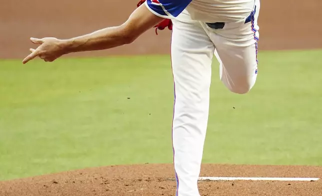 Atlanta Braves pitcher Chris Sale deliver against the Minnesota Twins during the first inning of a baseball game Saturday, April 19, 2025, in Atlanta. (AP Photo/John David Mercer)