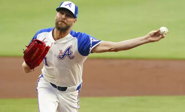 Atlanta Braves pitcher Chris Sale delivers against the Minnesota Twins during the first inning of a baseball game Saturday, April 19, 2025, in Atlanta. (AP Photo/John David Mercer)