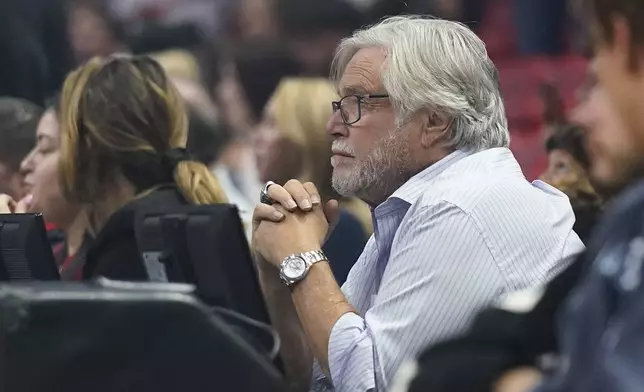FILE - Miami Heat Managing General Partner Micky Arison looks on before the start of a preseason NBA basketball game between the Heat and the Houston Rockets, Monday, Oct. 10, 2022, in Miami. (AP Photo/Wilfredo Lee, File)