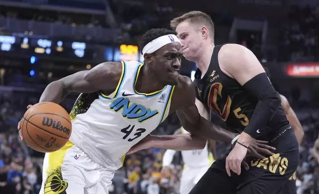 Indiana Pacers forward Pascal Siakam (43) drives on Cleveland Cavaliers guard Sam Merrill (5) during the second half of an NBA basketball game in Indianapolis, Thursday, April 10, 2025. (AP Photo/Michael Conroy)