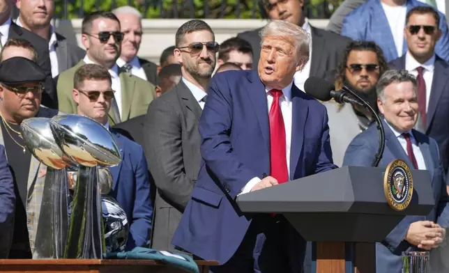 President Donald Trump speaks as he welcomes the Super Bowl champion Philadelphia Eagles NFL football team to the South Lawn of the White House, Monday, April 28, 2025, in Washington. (AP Photo/Mark Schiefelbein)