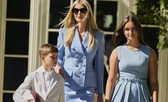 Ivanka Trump walks with two of her children before President Donald Trump welcomes the Super Bowl champion Philadelphia Eagles NFL football team to the South Lawn of the White House, Monday, April 28, 2025, in Washington. (AP Photo/Mark Schiefelbein)