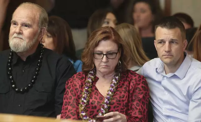 FILE - Larry Woodcock, from left, Kay Woodcock and Brandon Boudreaux attend the hearing for Lori Vallow Daybell on Friday, March 6, 2020, in Rexburg, Idaho. Daybell who is charged with felony child abandonment after her two children went missing nearly six months ago had her bond reduced to $1 million by an Idaho judge on Friday. (John Roark/The Idaho Post-Register via AP, Pool, File)