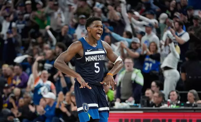 Minnesota Timberwolves guard Anthony Edwards (5) celebrates after making a 3-point shot during the second half of Game 4 of an NBA basketball first-round playoff series against the Los Angeles Lakers, Sunday, April 27, 2025, in Minneapolis. (AP Photo/Abbie Parr)