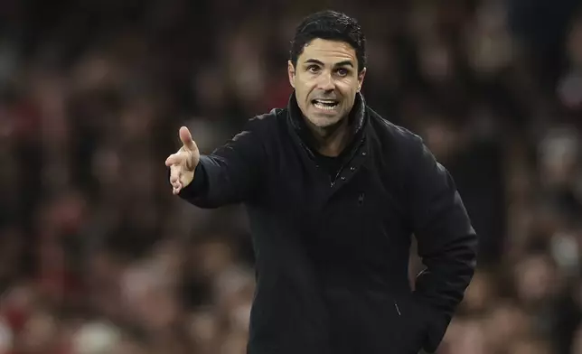 Arsenal's manager Mikel Arteta gestures during the English Premier League soccer match between Arsenal and Crystal Palace at Emirates stadium in London, Wednesday, April 23, 2025. (AP Photo/Ian Walton)