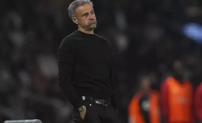 PSG's head coach Luis Enrique reacts during the League One soccer match between PSG and Nice in Paris Friday, April 25, 2025. (AP Photo/Thibault Camus)