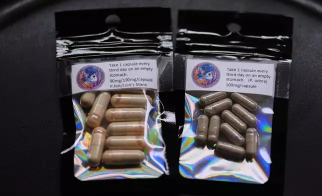 Capsules for microdosing psilocybin made by Marine Corps combat veteran Matt Metzger are pictured Wednesday, March 26, 2025, in Olympia, Wash. (AP Photo/Lindsey Wasson)
