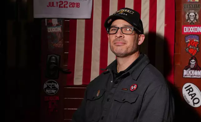 Marine Corps combat veteran Matt Metzger, who grows his own mushrooms for microdosing psilocybin, poses for a portrait Wednesday, March 26, 2025, in Olympia, Wash. (AP Photo/Lindsey Wasson)