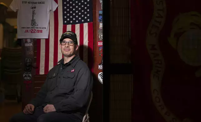 Marine Corps combat veteran Matt Metzger, who grows his own mushrooms for microdosing psilocybin, poses for a portrait Wednesday, March 26, 2025, in Olympia, Wash. (AP Photo/Lindsey Wasson)