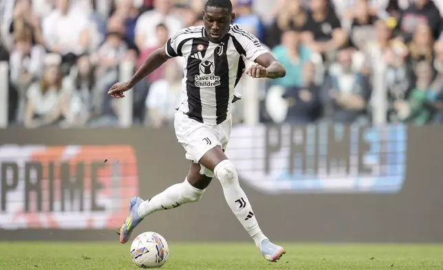 Juventus' Randal Kolo Muani scores his side's second goal during the during the Serie A soccer match between Juventus and Monza at the Allianz Stadium in Turin, Italy, Sunday, April 27, 2025. (Marco Alpozzi/LaPresse via AP)