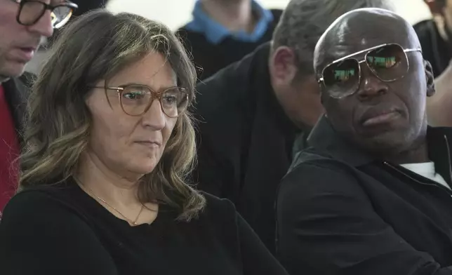 Kylian Mbappe's mother Fayza Lamari, and his father Wilfried Mbappe attend a press conference as Kylian Mbappe's legal team is going on the attack to try and solve the legal dispute between the World Cup winner and his former club PSG, Thursday, April 10, 2025 in Paris. (AP Photo/Michel Euler)