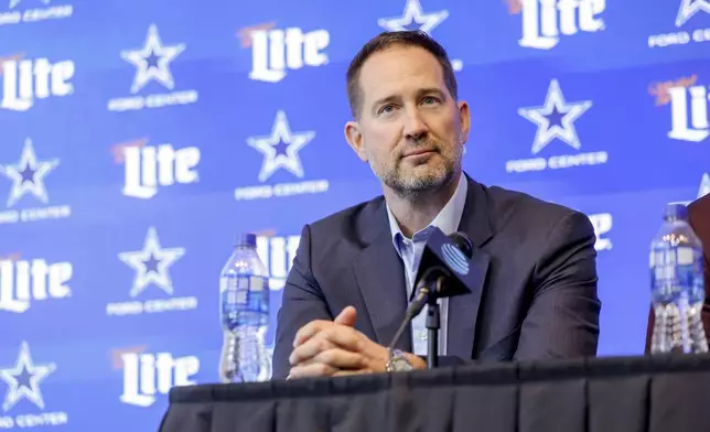 Dallas Cowboys head coach Brian Schottenheimer attends a news conference for the team's NFL football draft first-round pick Tyler Booker in Frisco, Texas, Friday, April 25, 2025. (AP Photo/Gareth Patterson)