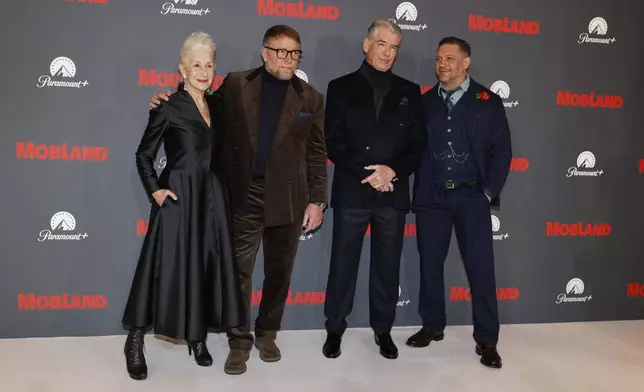 Helen Mirren, from left, director Guy Ritchie, Pierce Brosnan and Tom Hardy pose for photographers upon arrival at the premiere of 'MobLand' on Thursday, March 27, 2025, in London. (Photo by Millie Turner/Invision/AP)