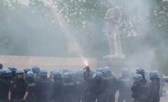 Lazio fans riot with police ahead of the Italian Serie A soccer match between Lazio and Roma at Rome's Olympic stadium, Sunday, April 13, 2025. (AP Photo/Gregorio Borgia)