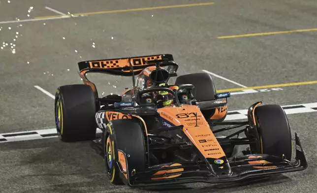 McLaren driver Oscar Piastri of Australia wins the Formula One Bahrain Grand Prix at Sakhir circuit, Sunday, April 13, 2025. (Andrej Isakovic Pool via AP)