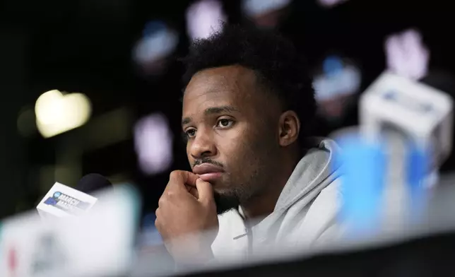 Houston guard L.J. Cryer speaks during a news conference at the Final Four of the NCAA college basketball tournament, Sunday, April 6, 2025, in San Antonio. (AP Photo/David J. Phillip)