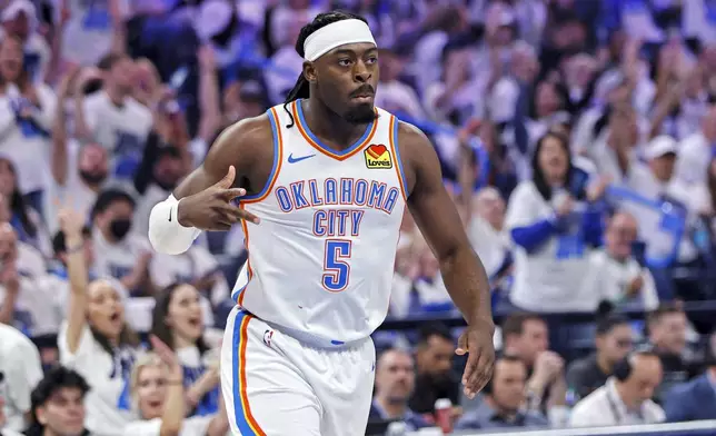 Oklahoma City Thunder guard Luguentz Dort gestures after making a 3-point basket during the first half in Game 1 of an NBA first-round playoff series against the Memphis Grizzlies, Sunday, April 20, 2025, in Oklahoma City. (AP Photo/Nate Billings)