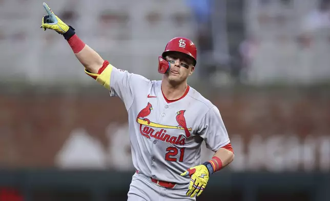 St. Louis Cardinals Lars Nootbaar (21) reacts after hitting a two-run home run in the third inning of a baseball game against the Atlanta Braves, Tuesday, April 22, 2025, in Atlanta. (AP Photo/Colin Hubbard)