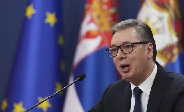 Serbian President Aleksandar Vucic speaks during a public address and announces the name of the representative for the composition of the new government in Belgrade, Serbia, Sunday, April 6, 2025. (AP Photo/Darko Vojinovic)