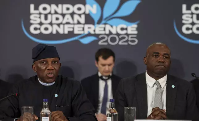 Bankole Adeoye, Political Affairs, Peace and Security Commissioner for the African Union, left, and Britain's Foreign Secretary David Lammy attend the London Sudan conference at Lancaster House in London, Tuesday, April 15, 2025. (Isabel Infantes/Pool Photo via AP)