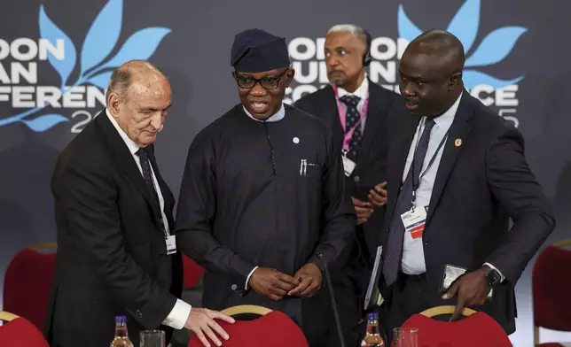 Bankole Adeoye, Political Affairs, Peace and Security Commissioner for the African Union, center, attends the London Sudan conference at Lancaster House in London, Tuesday, April 15, 2025. (Isabel Infantes/Pool Photo via AP)