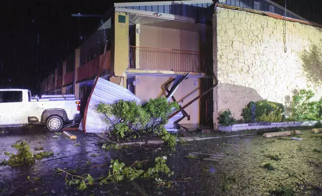 Debris covers the ground after severe storms passed the area in Ada, Okla., on Saturday, April 19, 2025. (Richard R. Barron/The ADA News via AP)