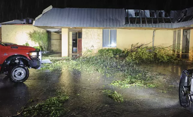 Debris covers the ground after severe storms passed the area in Ada, Okla., on Saturday, April 19, 2025. (Richard R. Barron/The ADA News via AP)